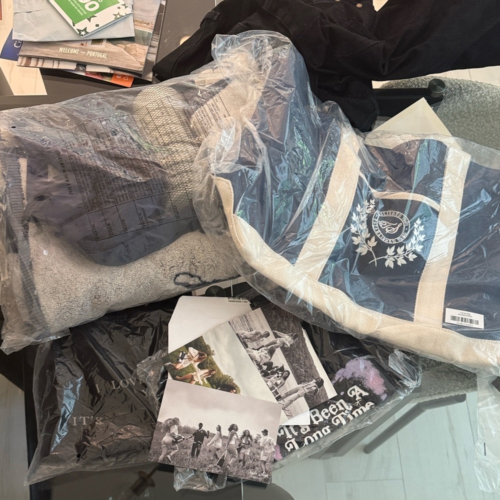 Lot of Taylor swift merchandise - towel, bag, shirts